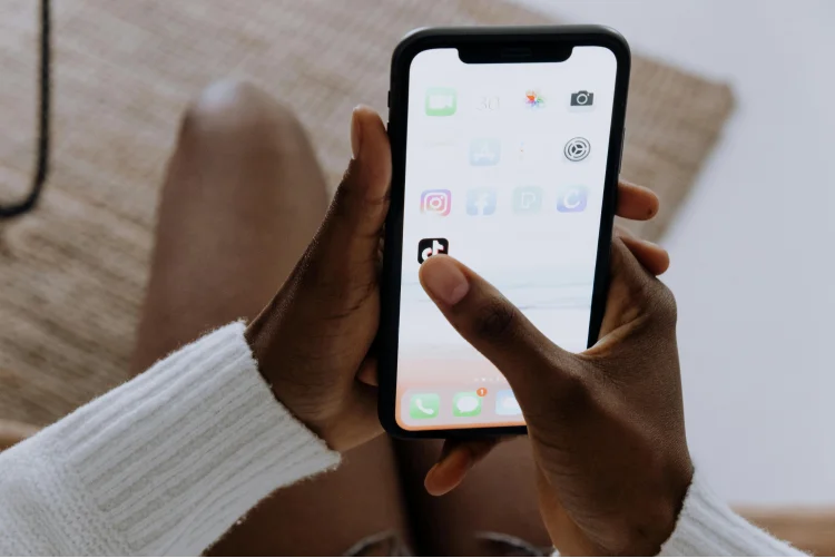 Person holding black iphone