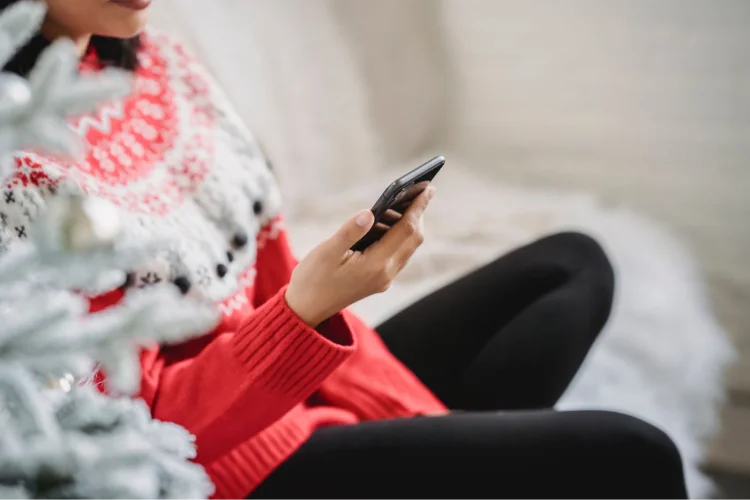 Woman sits on a couch